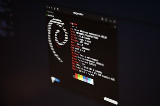 Tilix on a Debian GNU/Linux system running Neofetch